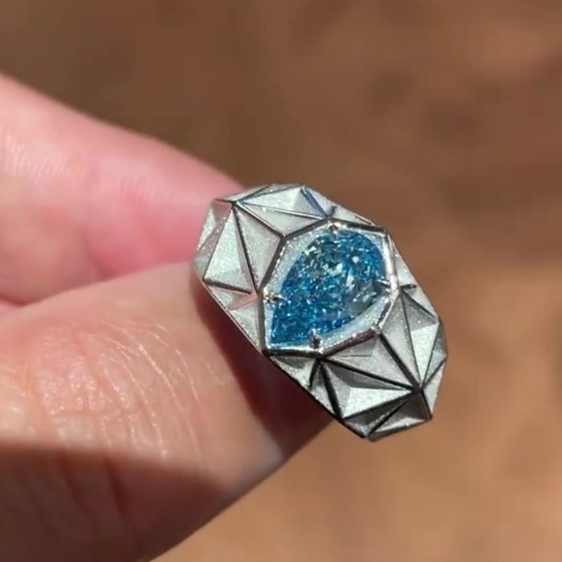 Jorrio handmade pear-shaped aqua blue architectural style men’s ring