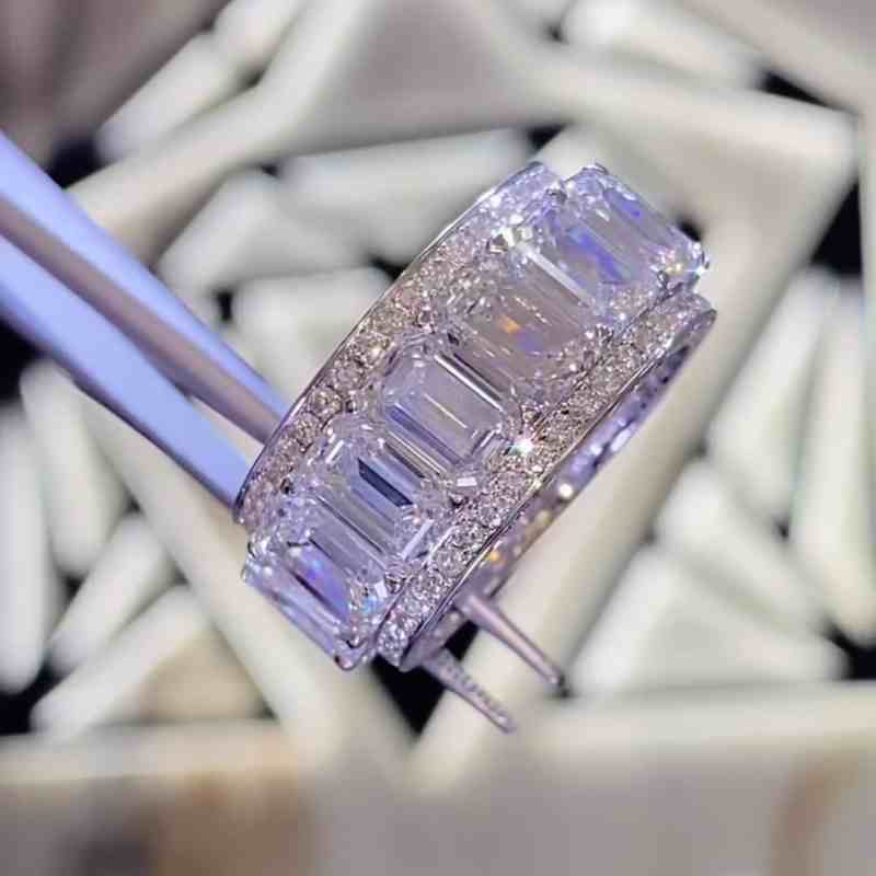 Jorrio handmade gold emerald cut sterling silver wedding band