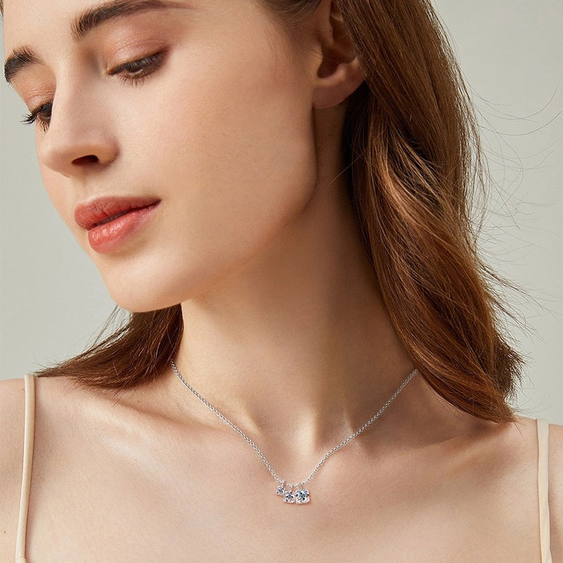 Jorrio handmade 0.9ct round cut glamorous three-stone moissanite sterling silver necklace