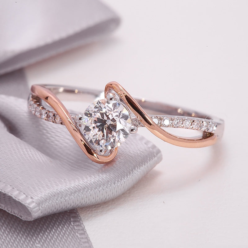 Jorrio round cut moissanite two-tone sterling silver ring